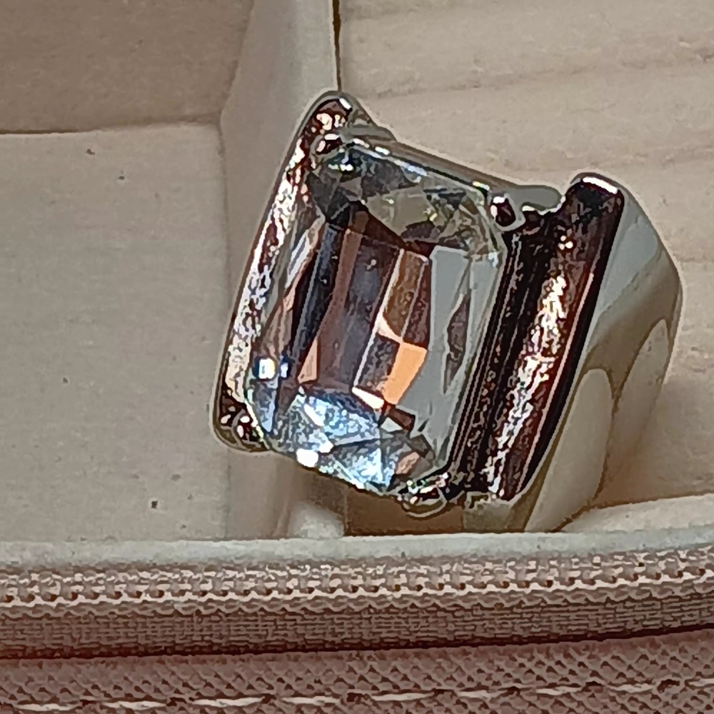 Elegant Silver-Toned Ring with Clear Gemstone NWOTs